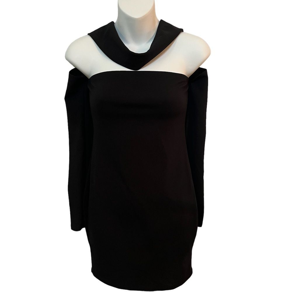 Little black dress with off the shoulder long sleeves and scarf like neckline